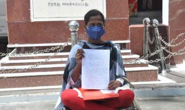 நுண்ணறிவு போலிஸ் மீது நடவடிக்கை கோரி பெண் தர்ணா!
