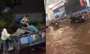 விமானத்தை பிடிக்க டிராக்டரில் வந்த பயணிகள்:- கனமழை கலாட்டா!